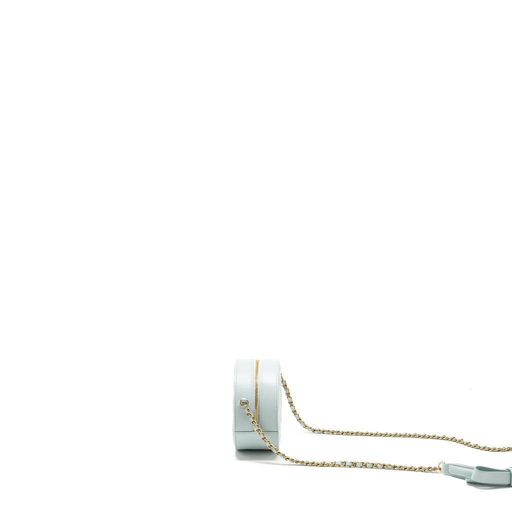 CHANEL MINI ROUND VANITY WITH RIBBON ON CHAIN LAMBSKIN LIGHT BLUE LGHW