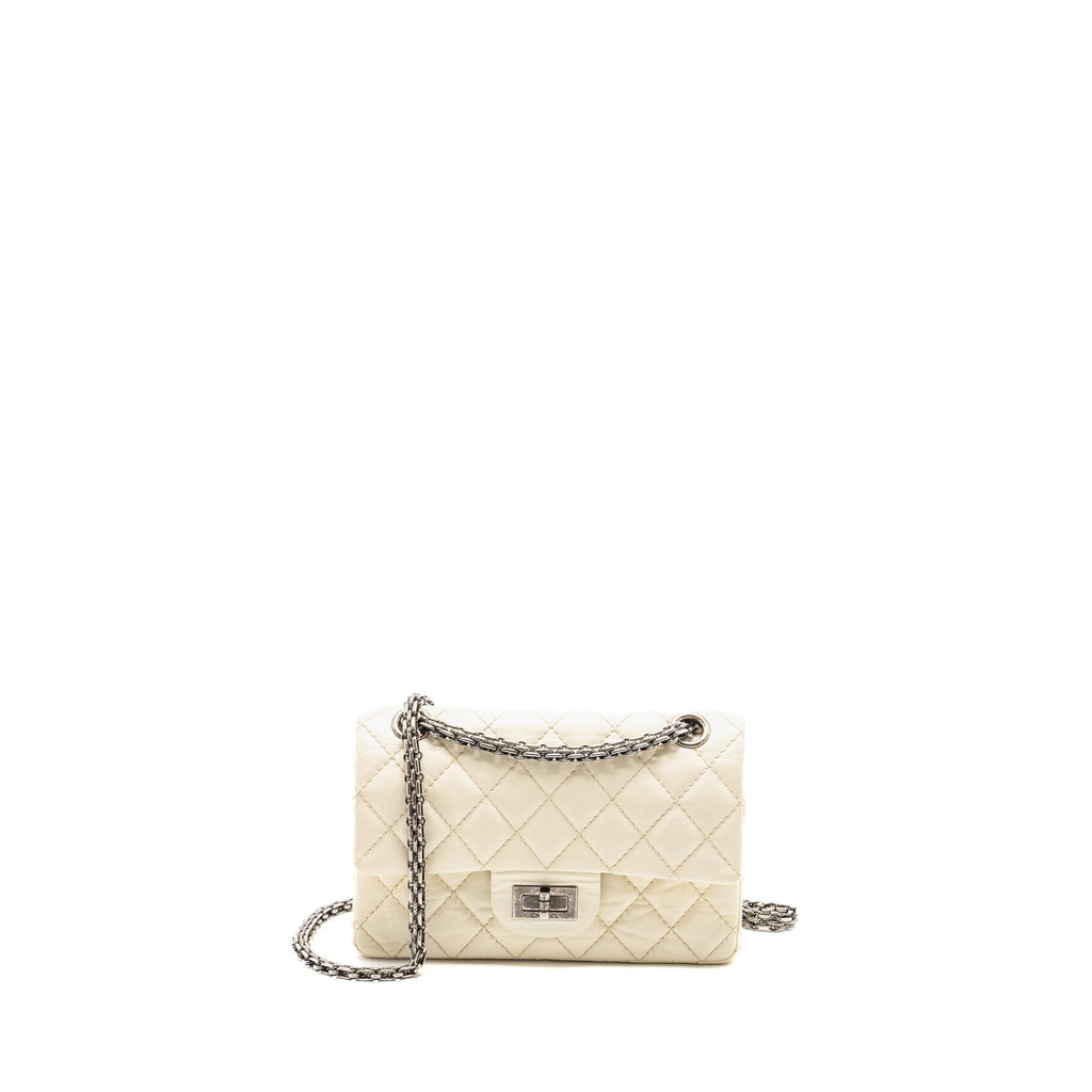 CHANEL MINI 2.55 REISSUE FLAP BAG AGED CALFSKIN CREAMY WHITE WITH RUTHENIUM HARDWARE