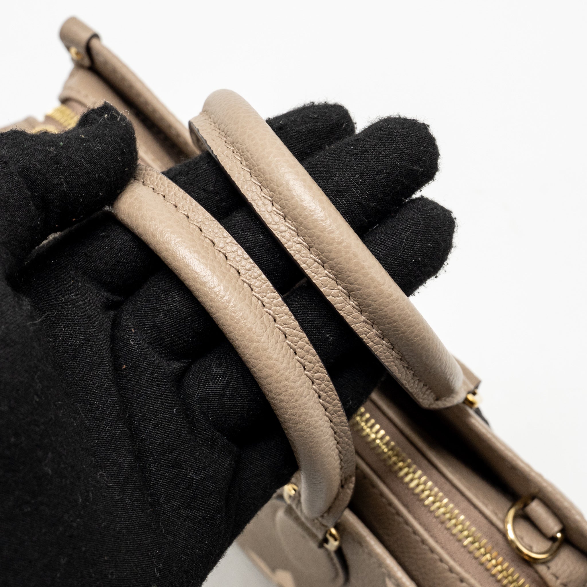 LOUIS VUITTON ONTHEGO EAST WEST MONOGRAM EMPREINTE LEATHER DOVE/CREAM GHW