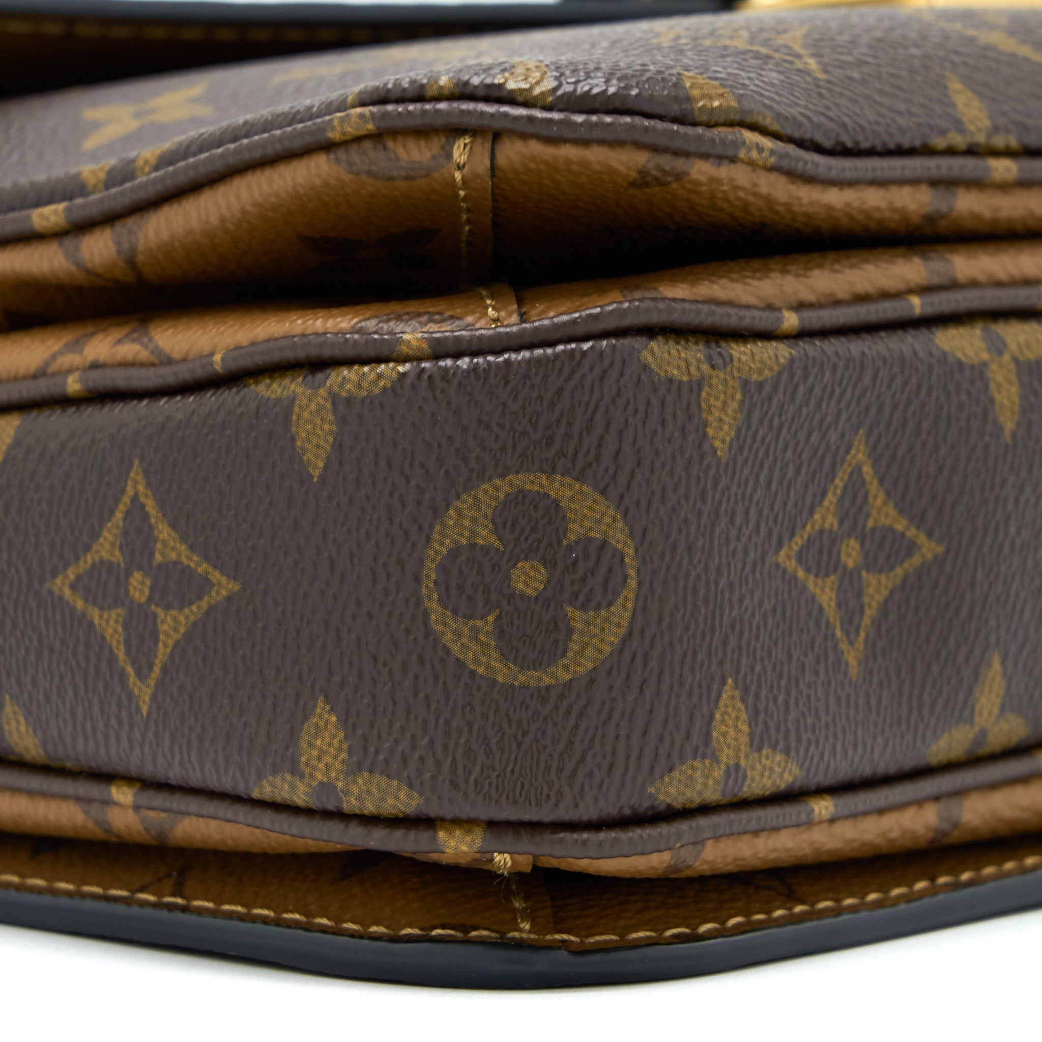 LOUIS VUITTON POCHETTE MÉTIS MONOGRAM REVERSE CANVAS GHW