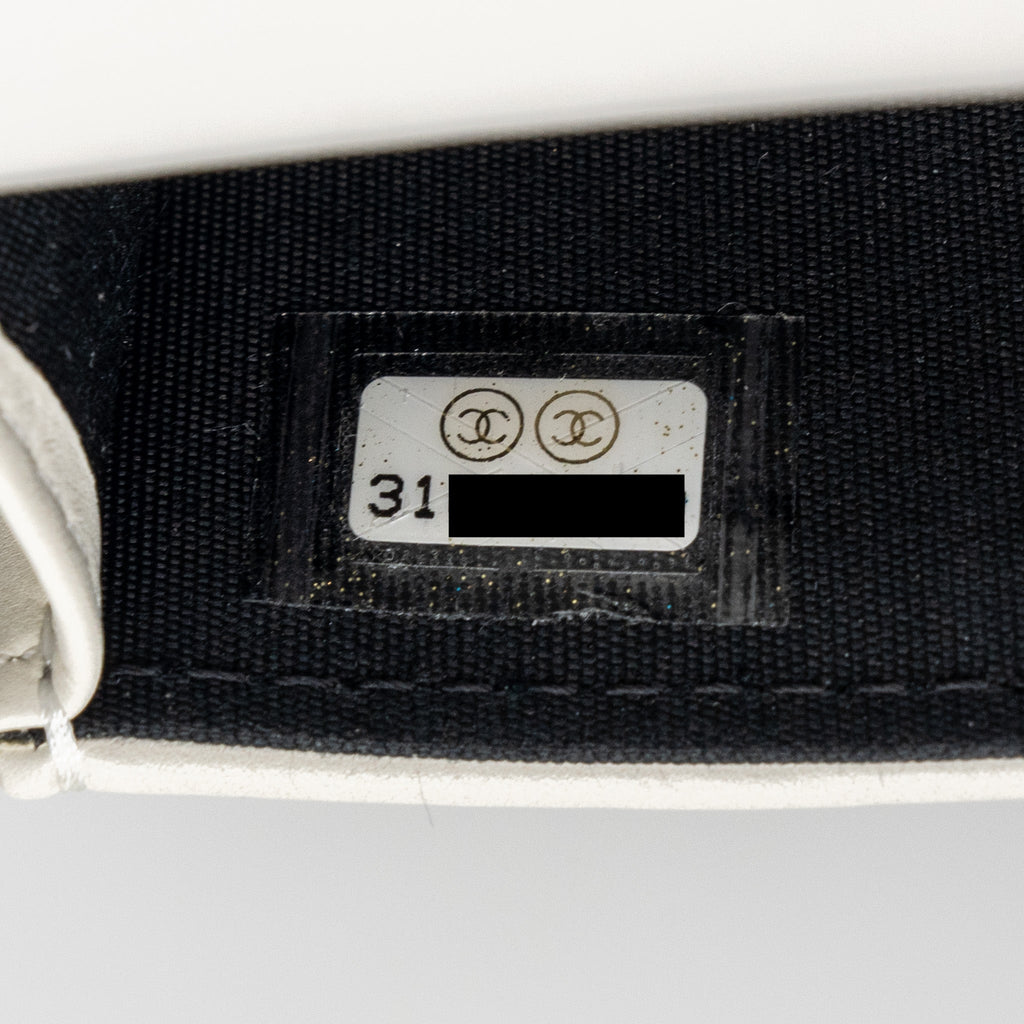 CHANEL VERTICAL 19 PHONE CASE LAMBSKIN WHITE WITH BLACK HARDWARE