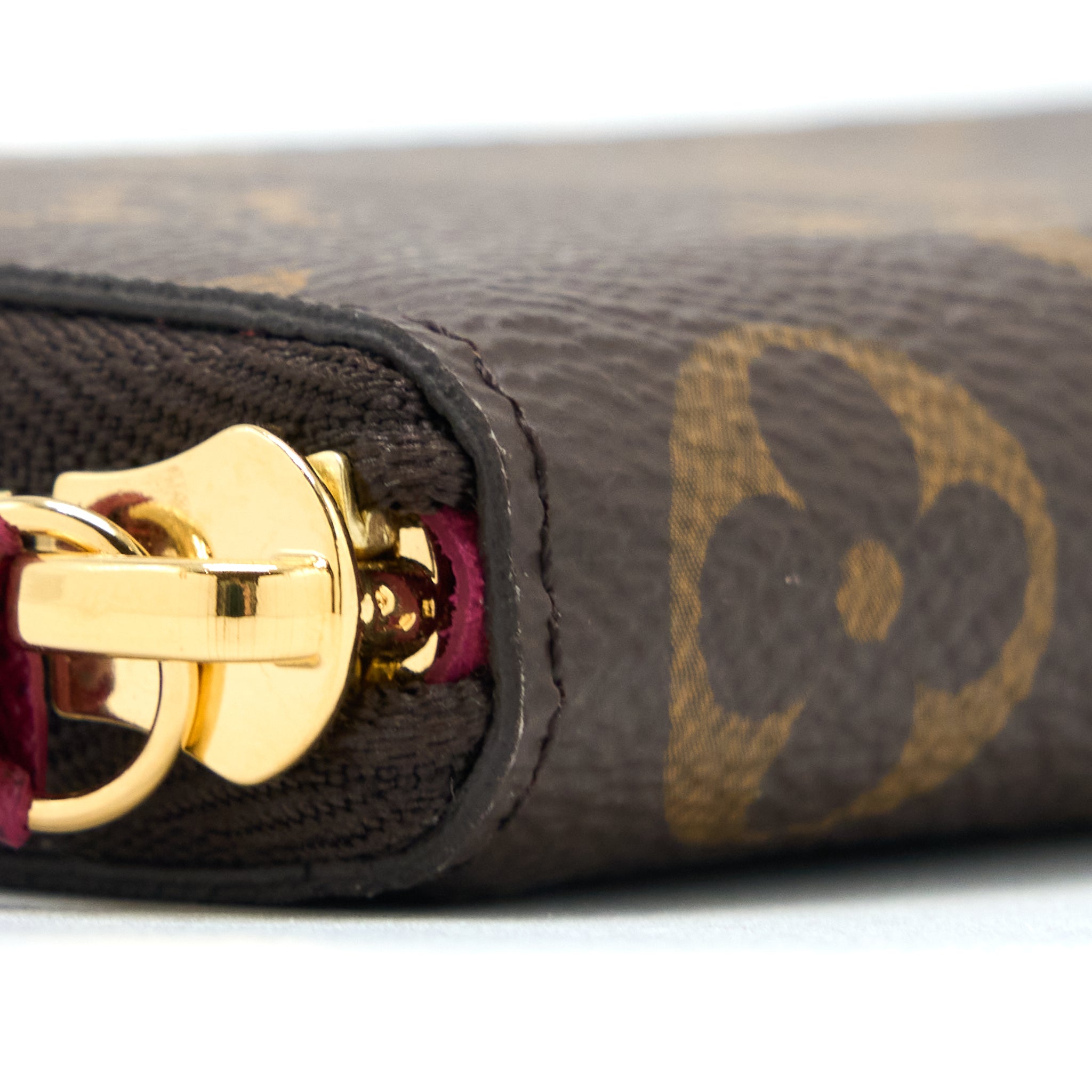 LOUIS VUITTON CLEMENCE LONG WALLET MONOGRAM CANVAS FUCHSIA GHW