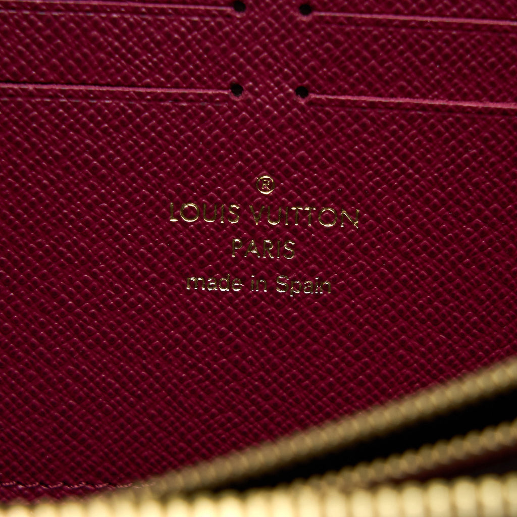 LOUIS VUITTON CLEMENCE LONG WALLET MONOGRAM CANVAS FUCHSIA GHW