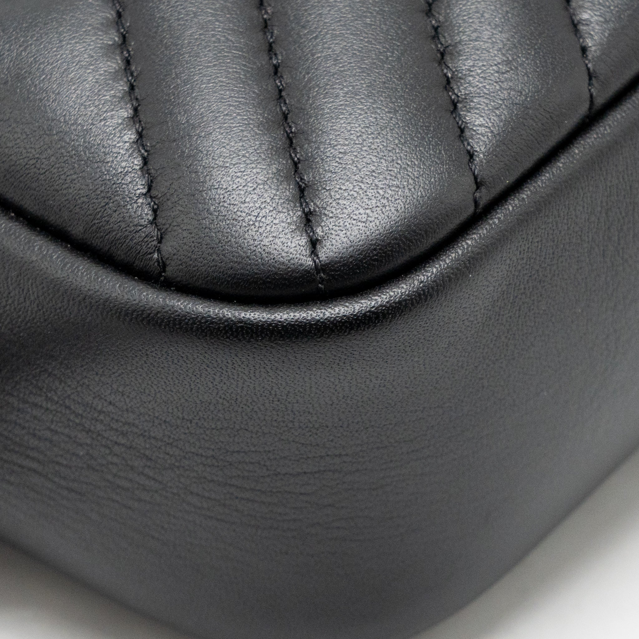 CHANEL DIAGONAL CHEVRON CAMERA BAG WITH DETAILED TASSEL CALFSKIN BLACK SHW