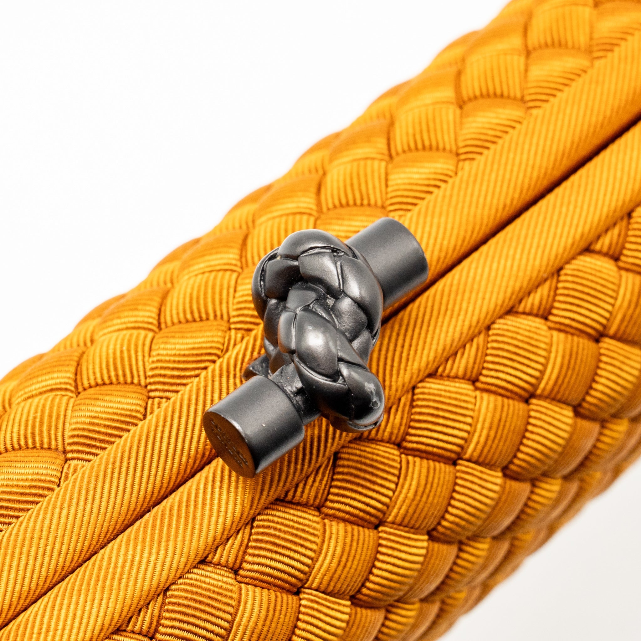 BOTTEGA VENETA INTRECCIO IMPERO AYERS STRETCH KNOT CLUTCH SATIN ORANGE RUTHENIUM HARDWARE