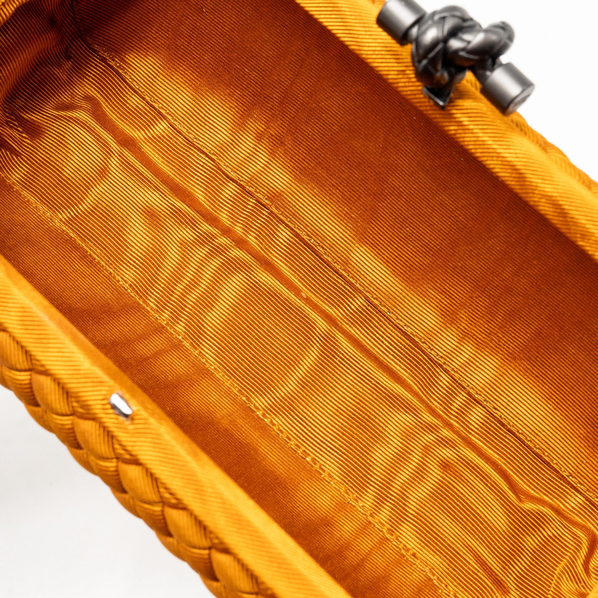 BOTTEGA VENETA INTRECCIO IMPERO AYERS STRETCH KNOT CLUTCH SATIN ORANGE RUTHENIUM HARDWARE