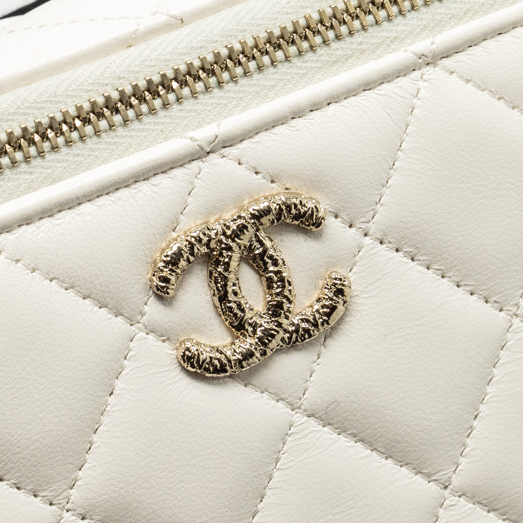 CHANEL 23K CAMELLIA TOP HANDLE LONG VANITY CASE WITH CHAIN CALFSKIN WHITE LGHW (MICROCHIP)