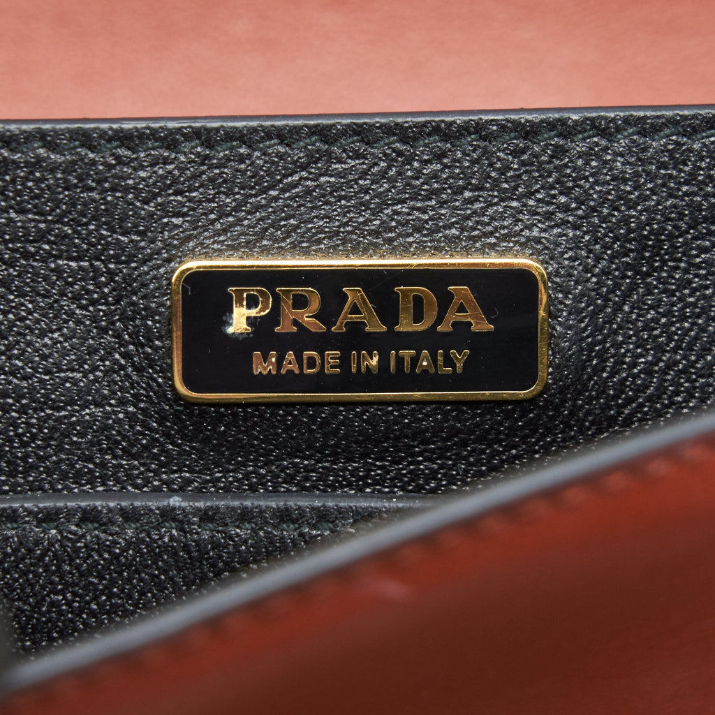 PRADA LEATHER CASHIER BAG BURGUNDY/ BLACK GHW