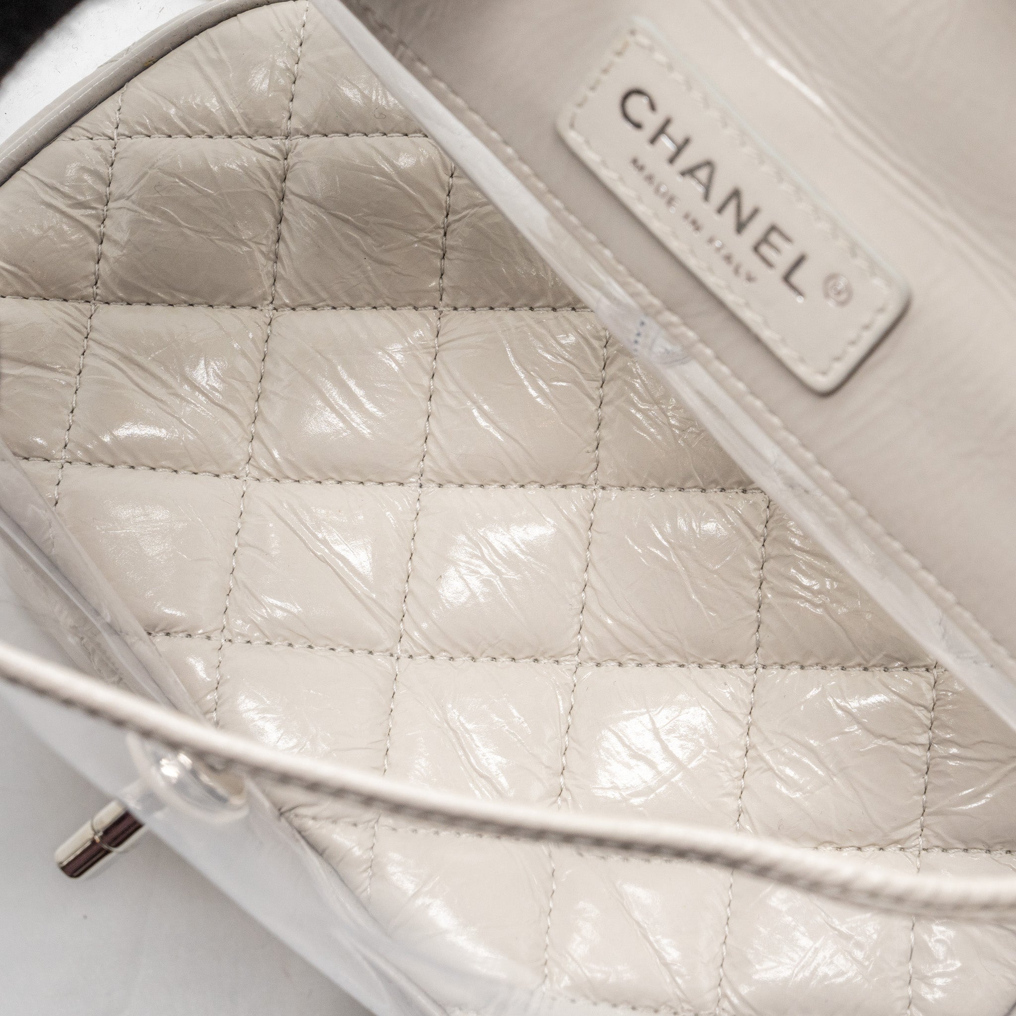 CHANEL TRANSPARENT BACKPACK PVC/SHINY CALFSKIN WHITE SHW