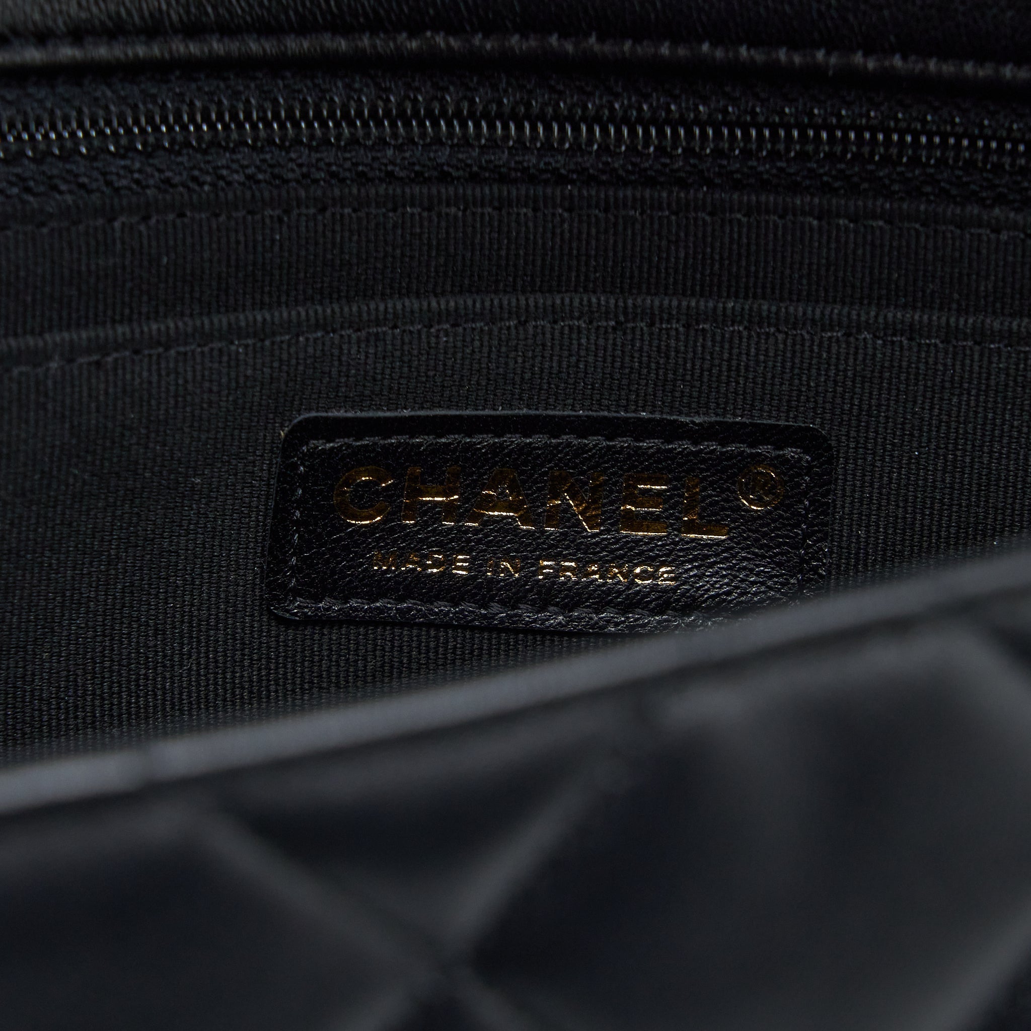 CHANEL QUILTED DETAILED LOGO FLAP BAG LAMBSKIN BLACK GHW (MICROCHIP)
