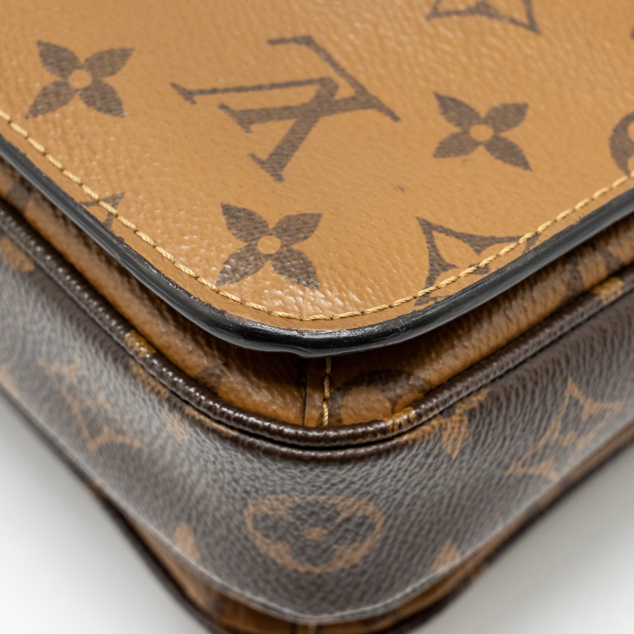 LOUIS VUITTON POCHETTE MÉTIS MONOGRAM REVERSE CANVAS GHW