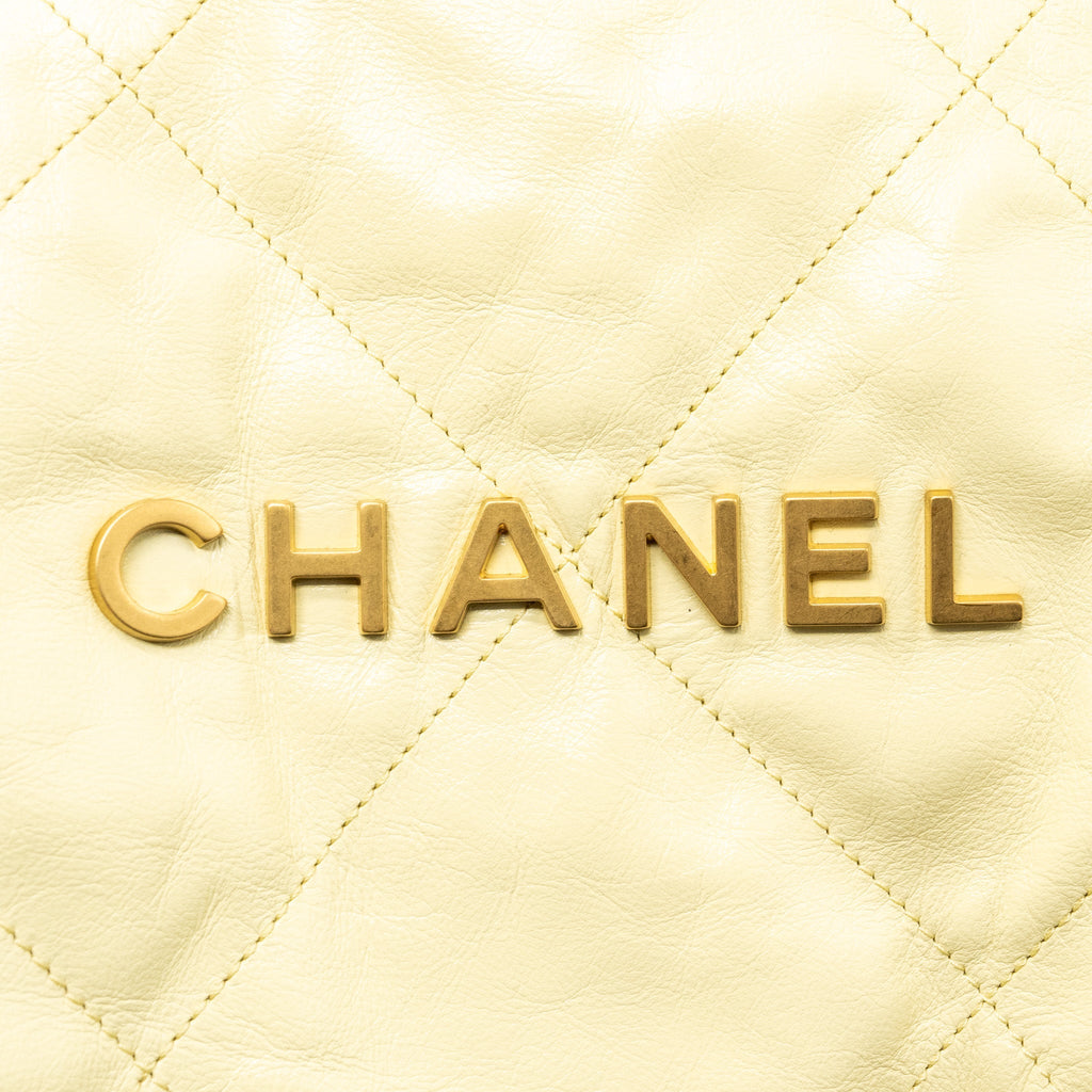 CHANEL 23P SMALL 22 BACKPACK SHINY CALFSKIN LIGHT YELLOW BRUSHED GHW(MICROCHIP)