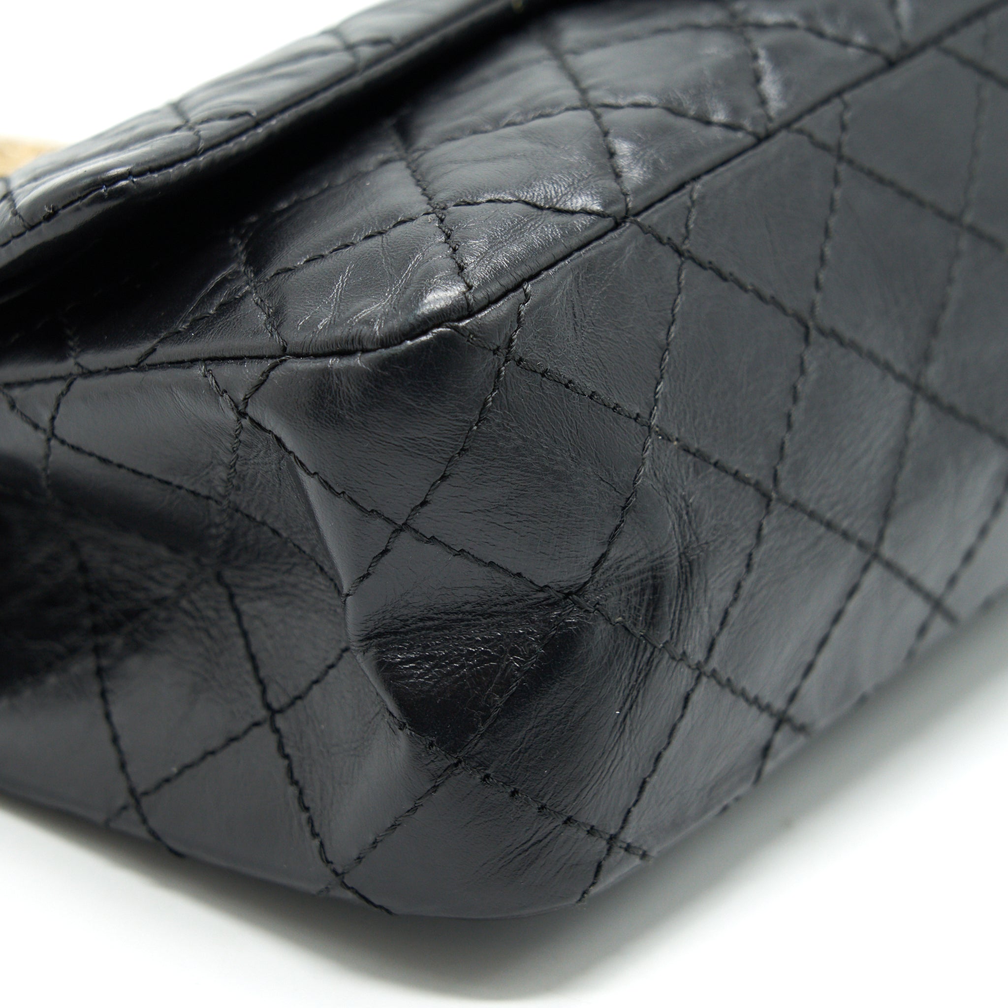 CHANEL 2.55 REISSUE SMALL FLAP BAG AGED CALFSKIN IN BLACK GHW