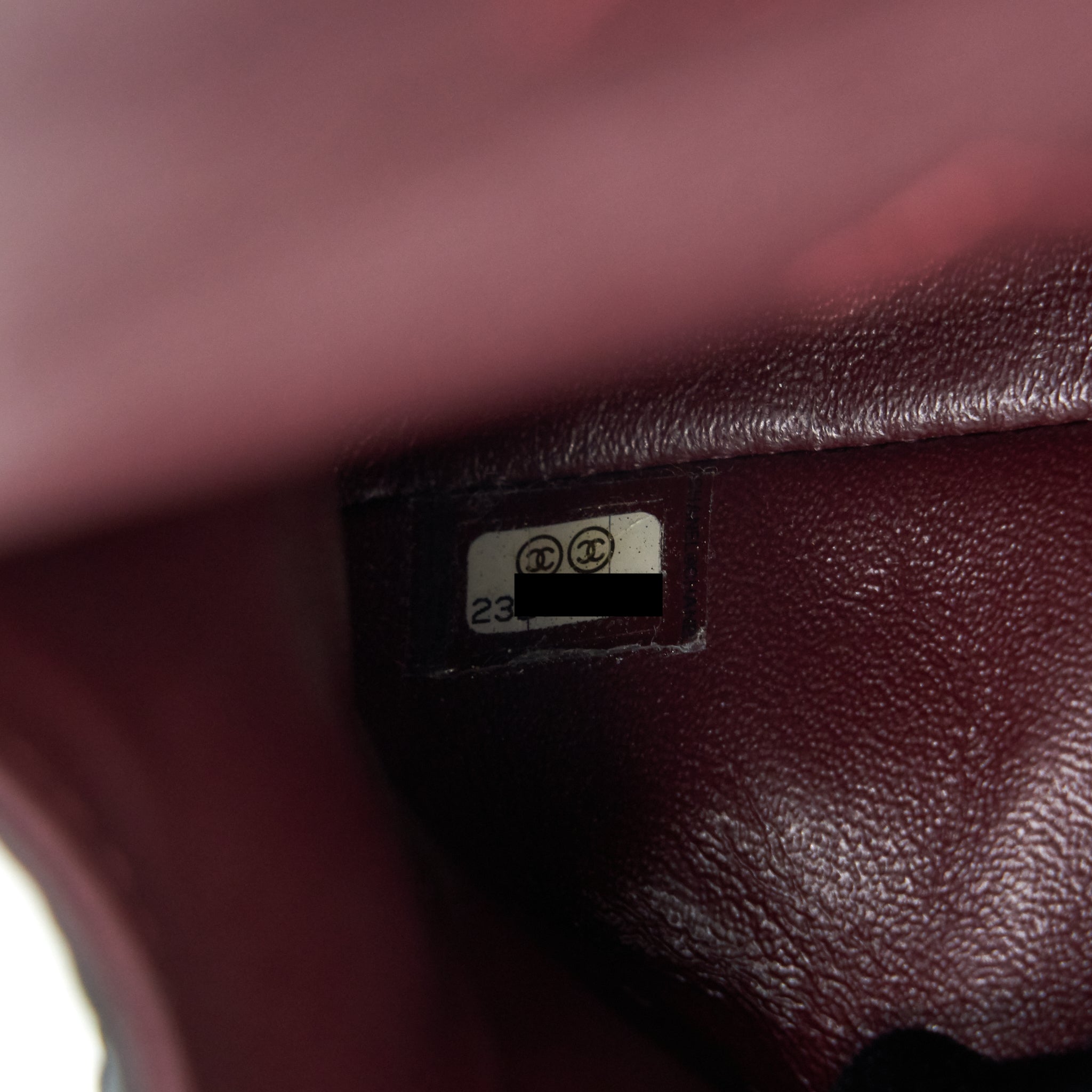 CHANEL 2.55 REISSUE SMALL FLAP BAG AGED CALFSKIN IN BLACK GHW