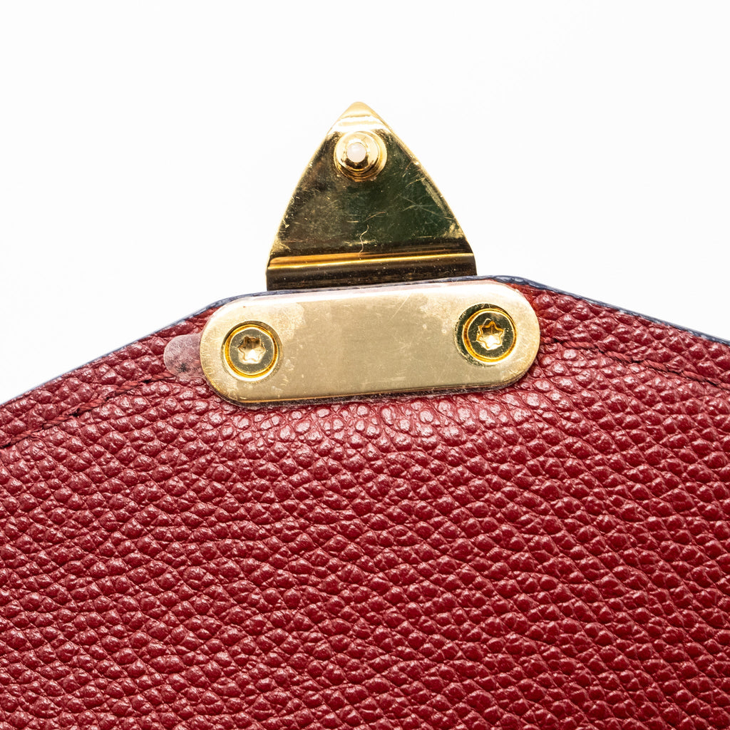 LOUIS VUITTON POCHETTE MÉTIS MONOGRAM EMPREINTE RED GHW