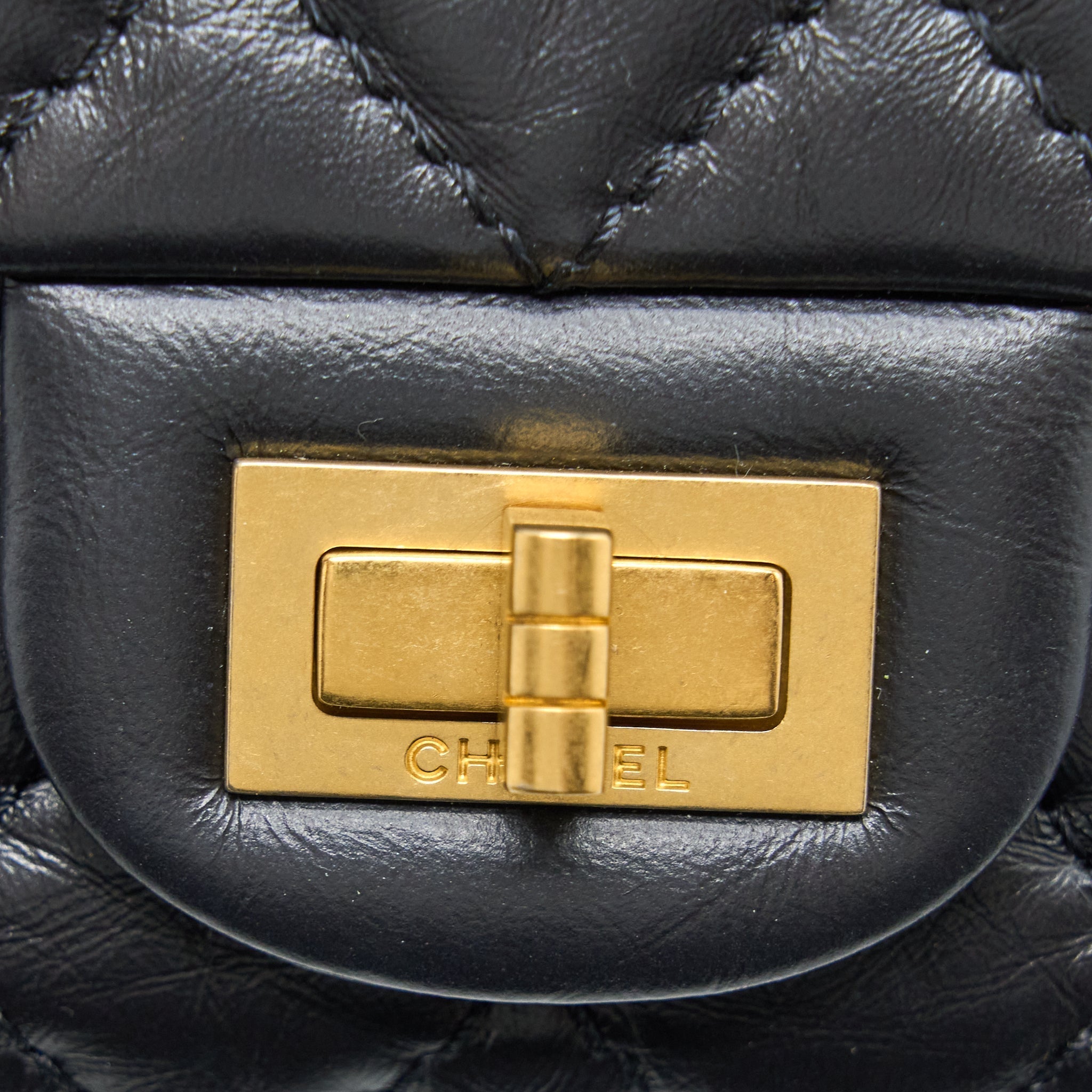 CHANEL SMALL 2.55 REISSUE FLAP BAG AGED CALFSKIN BLACK BRUSHED GHW (MICROCHIP)