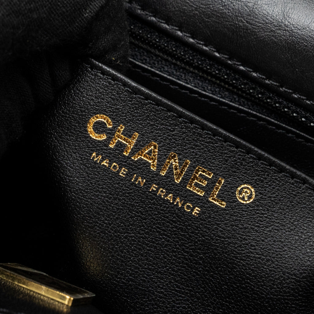 CHANEL MINI 2.55 REISSUE FLAP BAG AGED CALFSKIN BLACK GHW (MICROCHIP)