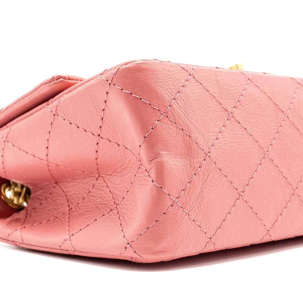 CHANEL MINI 2.55 REISSUE FLAP BAG CALFSKIN PINK GHW