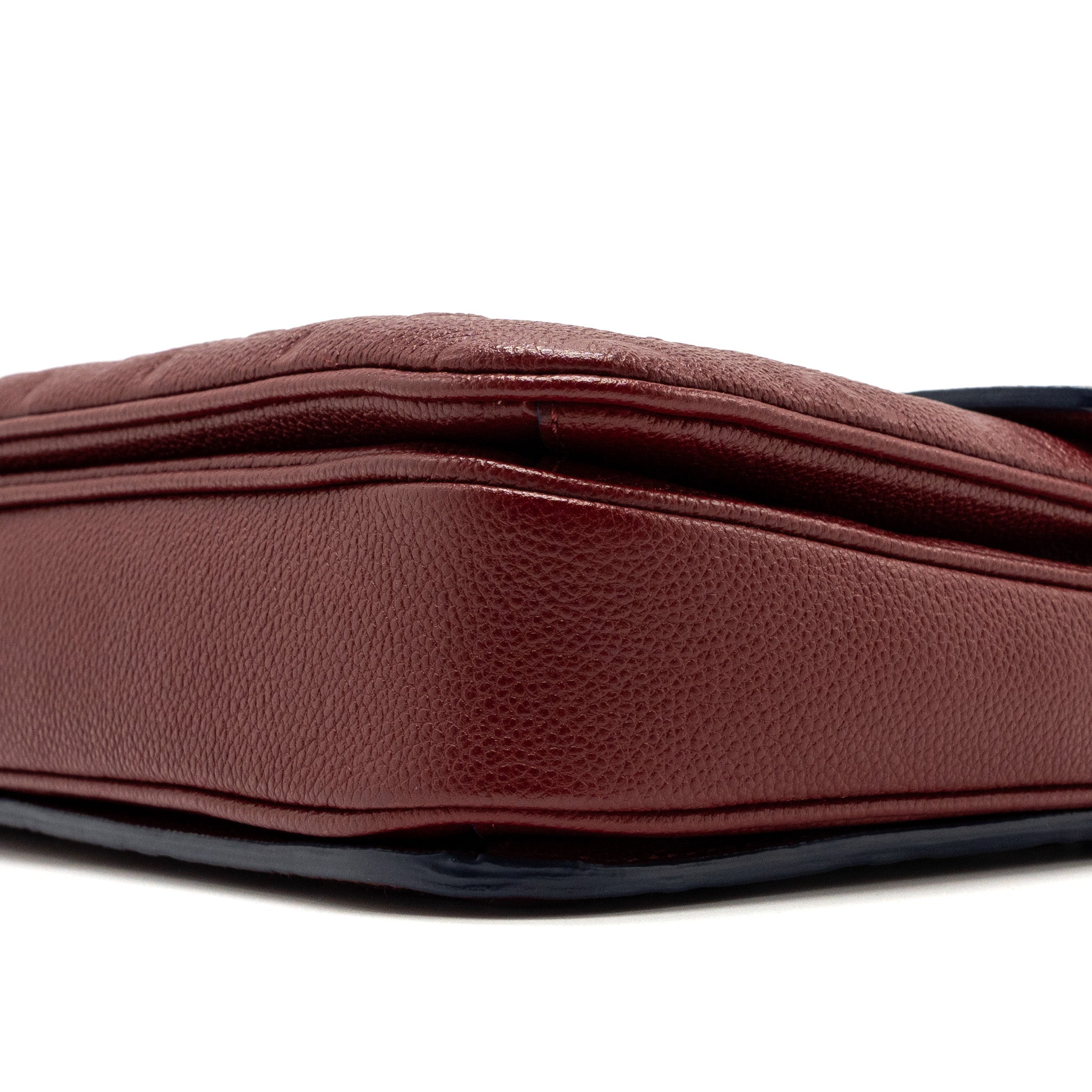 LOUIS VUITTON POCHETTE MÉTIS MONOGRAM EMPREINTE RED GHW