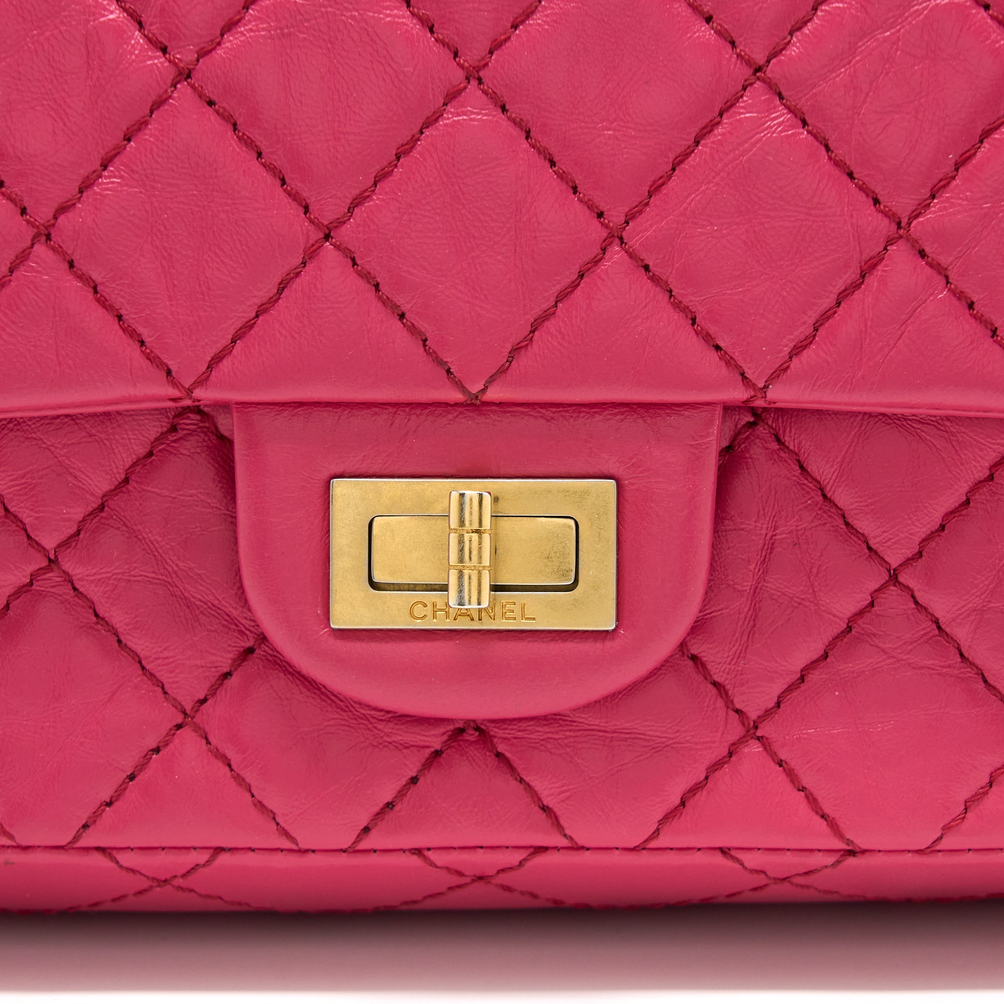 CHANEL SMALL 2.55 REISSUE AGED CALFSKIN HOT PINK BRUSHED GHW