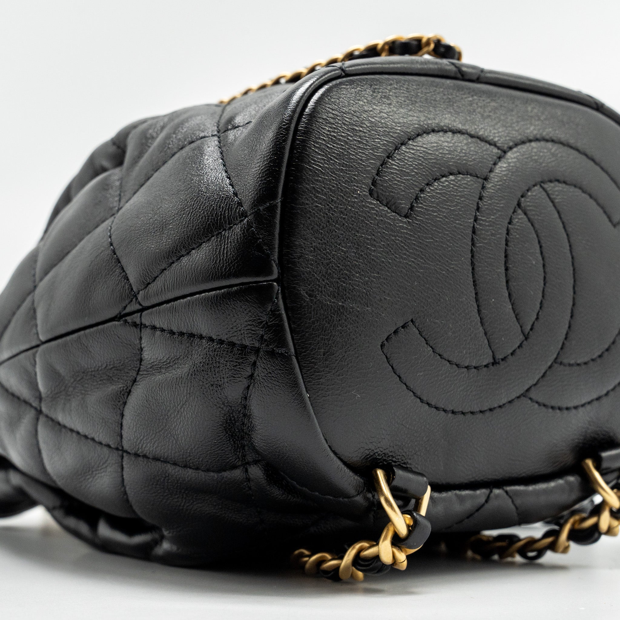 CHANEL 22S CANDY CHAINS MINI BUCKET BACKPACK LAMBSKIN BLACK GHW (MICROCHIP)