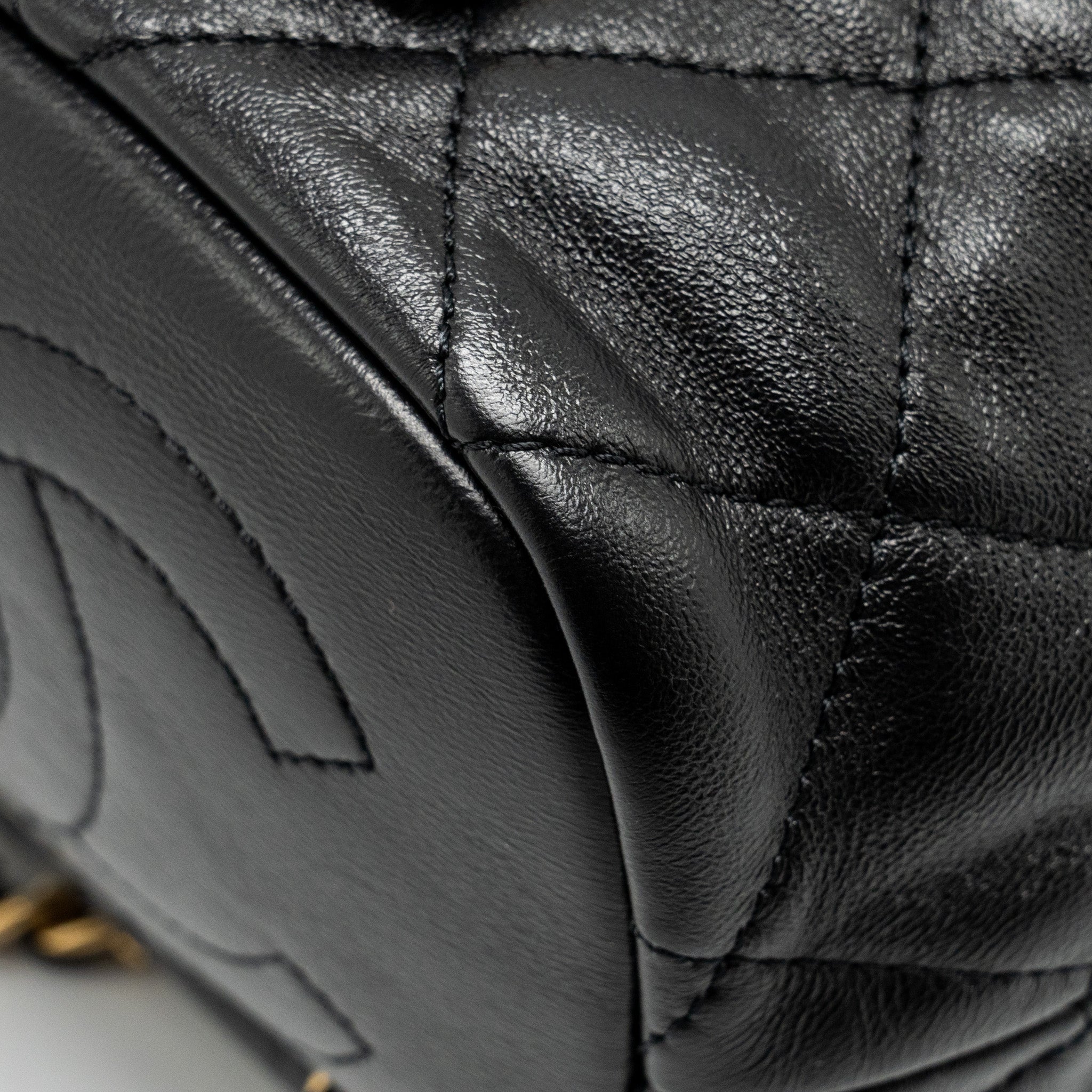 CHANEL 22S CANDY CHAINS MINI BUCKET BACKPACK LAMBSKIN BLACK GHW (MICROCHIP)
