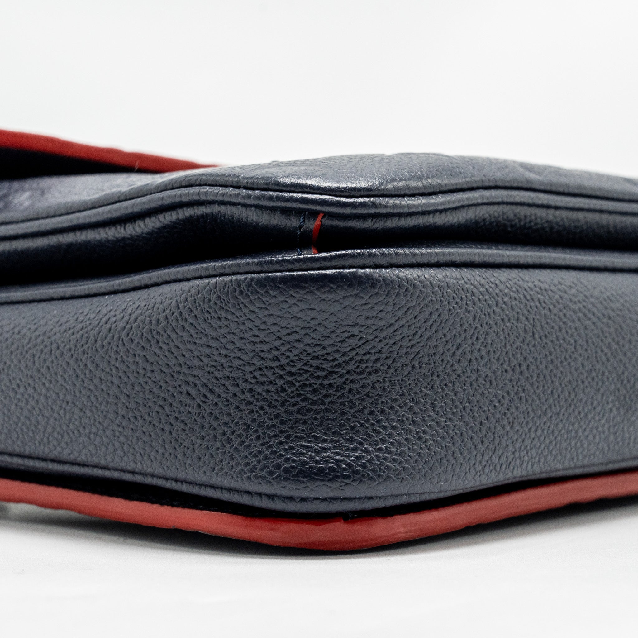 LOUIS VUITTON POCHETTE METIS MONOGRAM EMPREINETE NAVY GHW