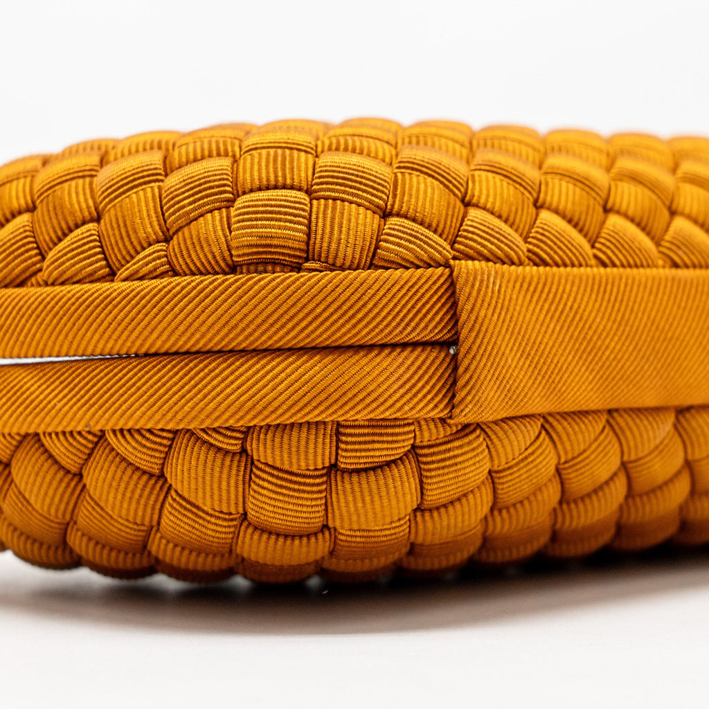BOTTEGA VENETA INTRECCIO IMPERO AYERS STRETCH KNOT CLUTCH SATIN ORANGE RUTHENIUM HARDWARE