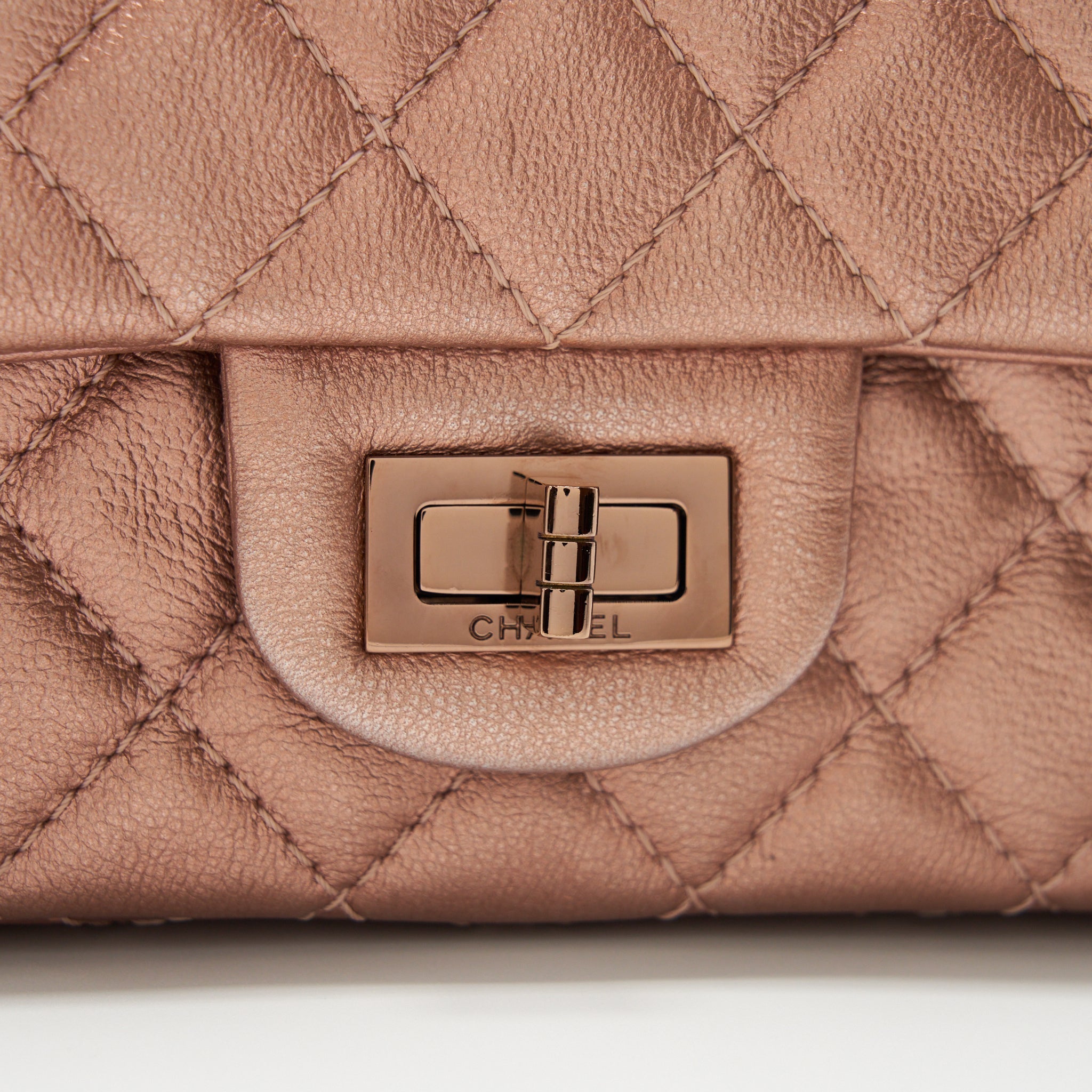 CHANEL MINI 2.55 REISSUE FLAP BAG CALFSKIN METALLIC PINK (MICROCHIP)