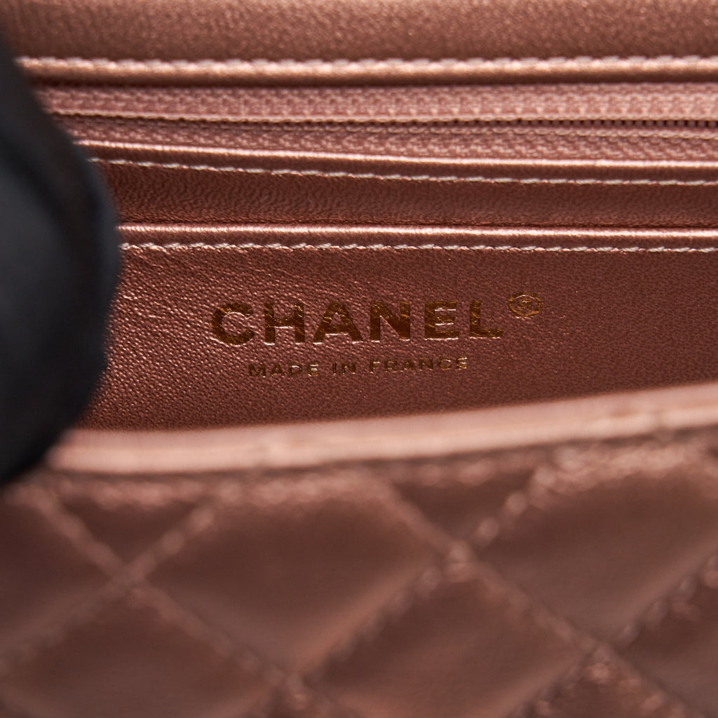 CHANEL MINI 2.55 REISSUE FLAP BAG CALFSKIN METALLIC PINK (MICROCHIP)