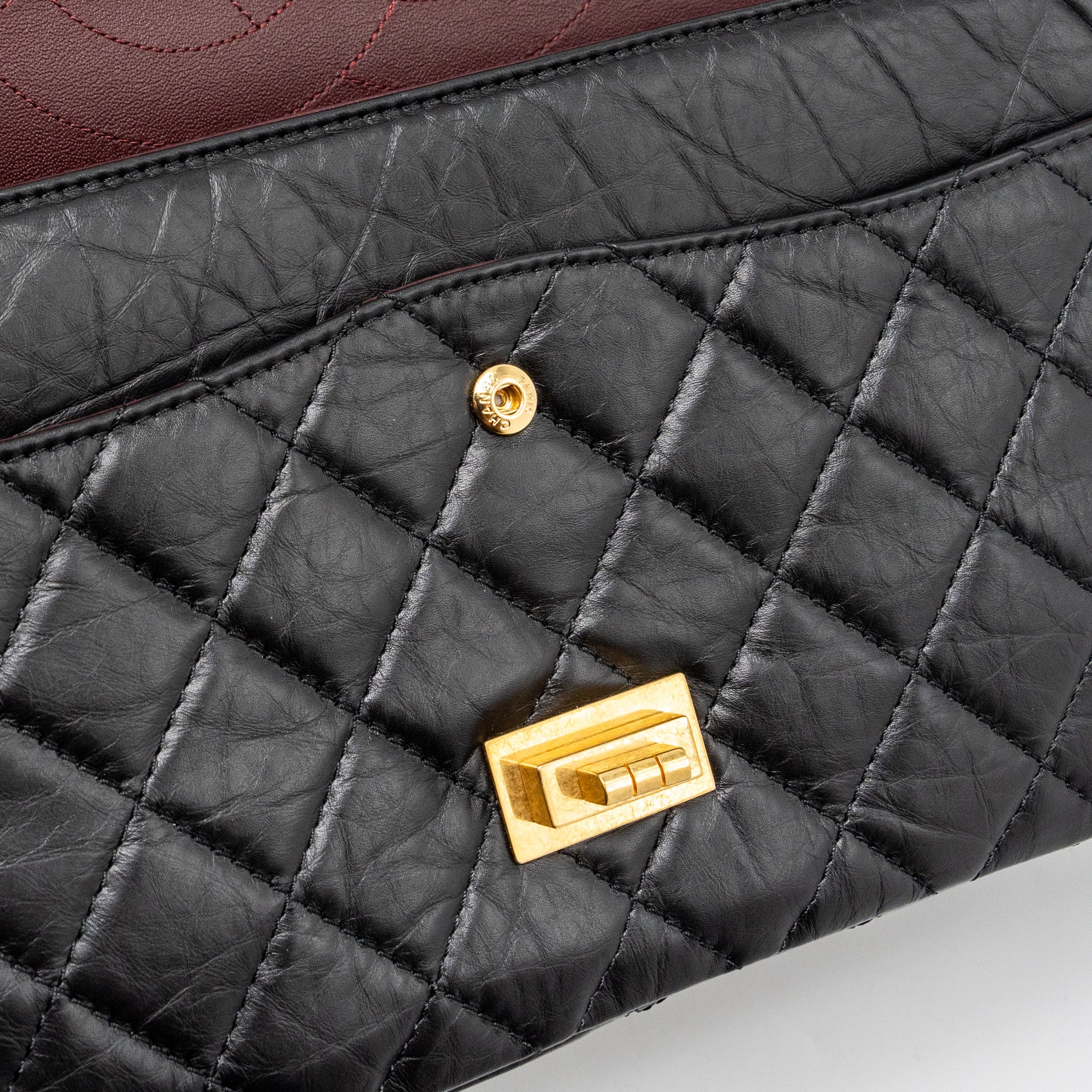 CHANEL MAXI 2.55 REISSUE FLAP BAG AGED CALFSKIN BLACK GHW