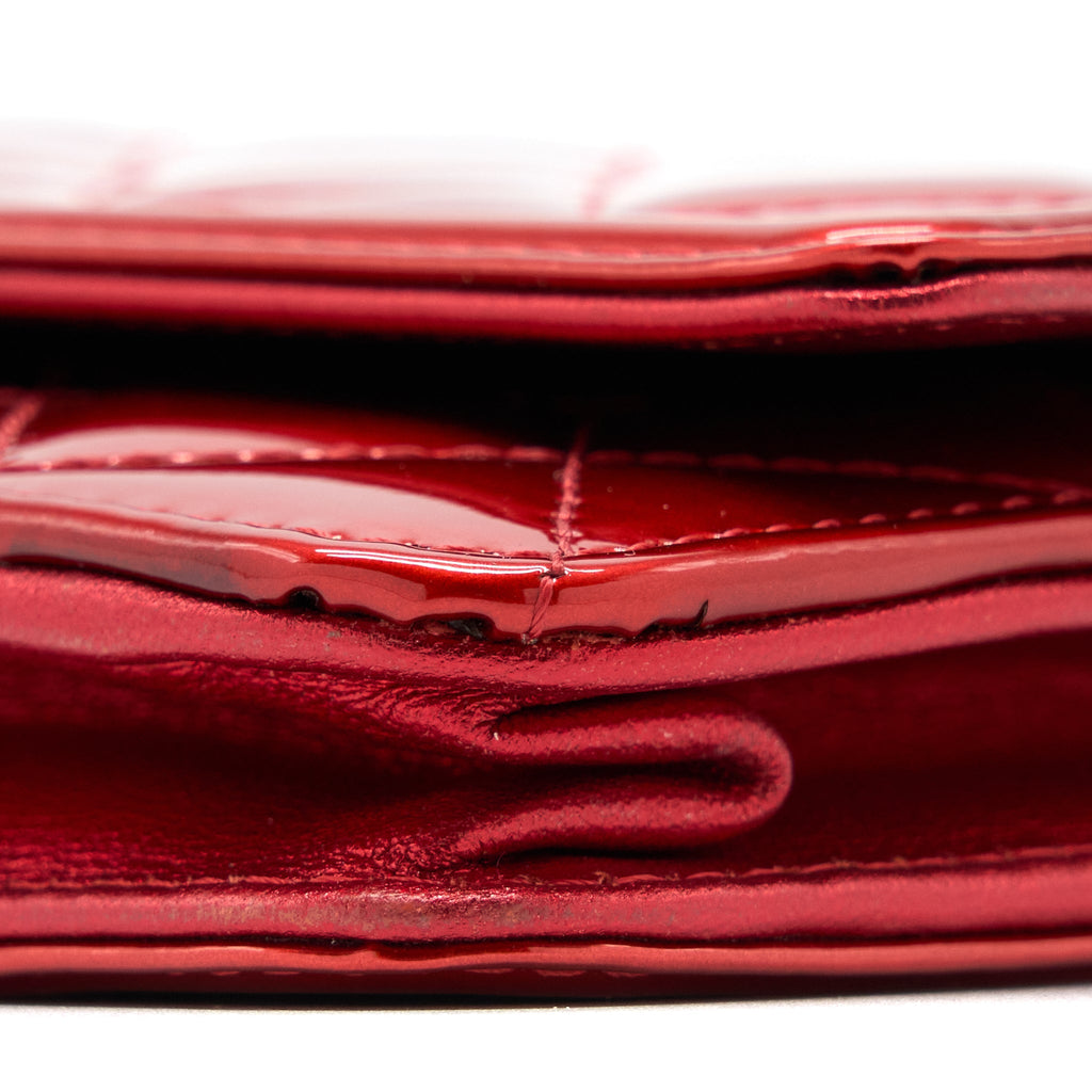 CHANEL BOY WALLET ON CHAIN PATENT METALLIC RED SHW