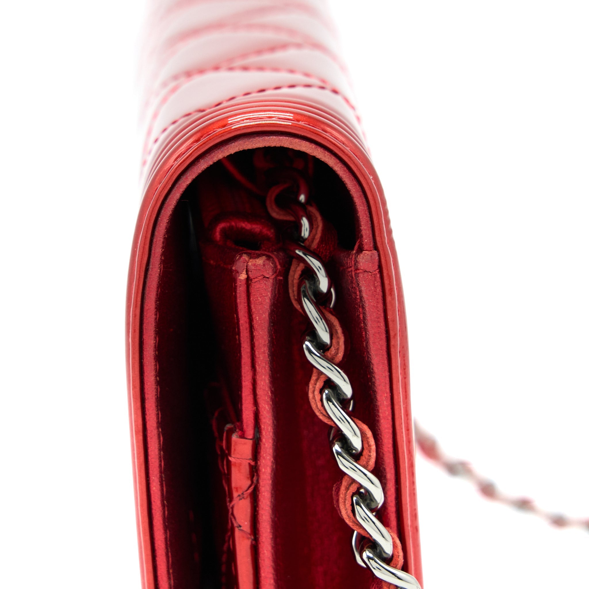 CHANEL BOY WALLET ON CHAIN PATENT METALLIC RED SHW