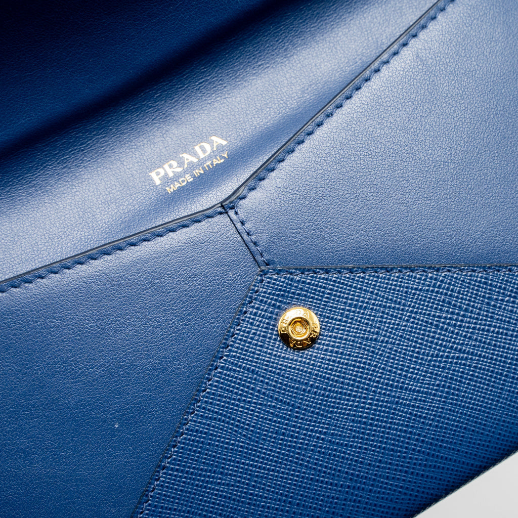 PRADA SAFFIANO CLUTCH CALFSKIN BLUE GHW