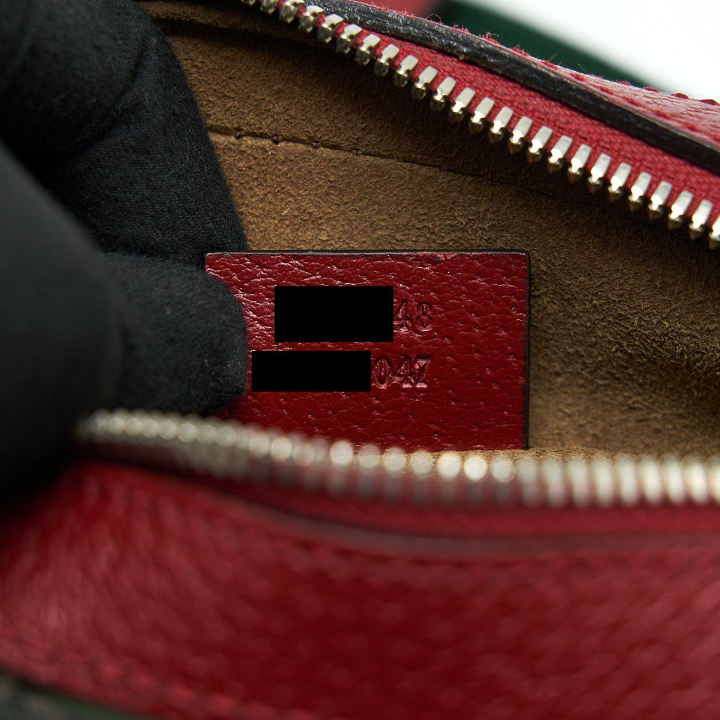GUCCI PRINTED SUPREME CANVAS CAMERA BAG RED