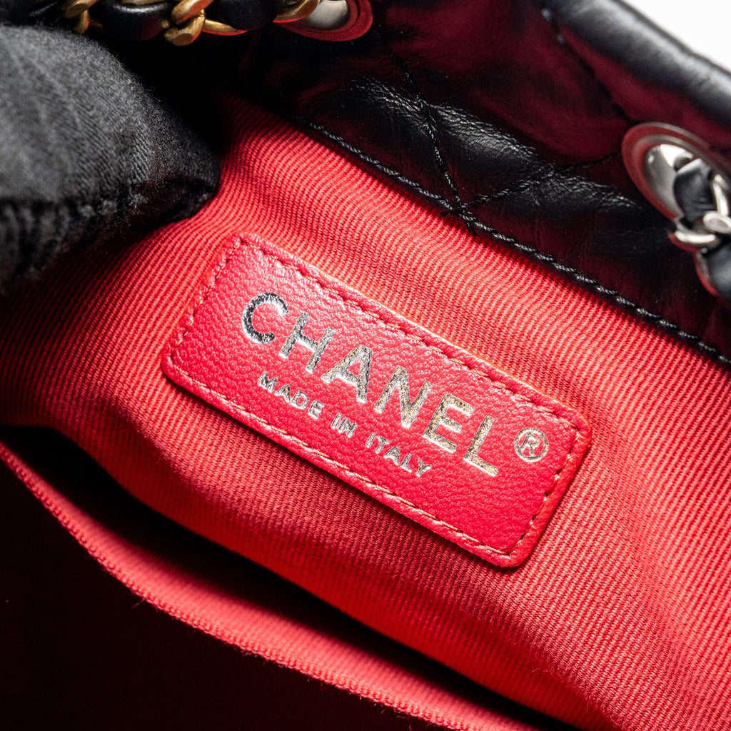 CHANEL SMALL GABRIELLE BACKPACK AGED CALFSKIN BLACK MULTICOLOUR COLOUR HARDWARE (MICROCHIP)