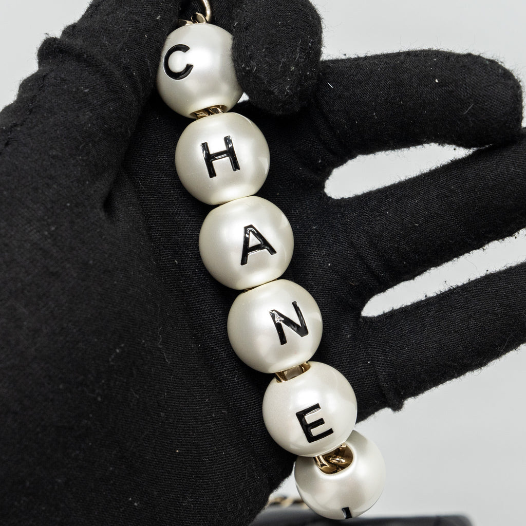 CHANEL QUILTED FLAP BAG WITH PEARL CHAIN LAMBSKIN BLACK LGHW