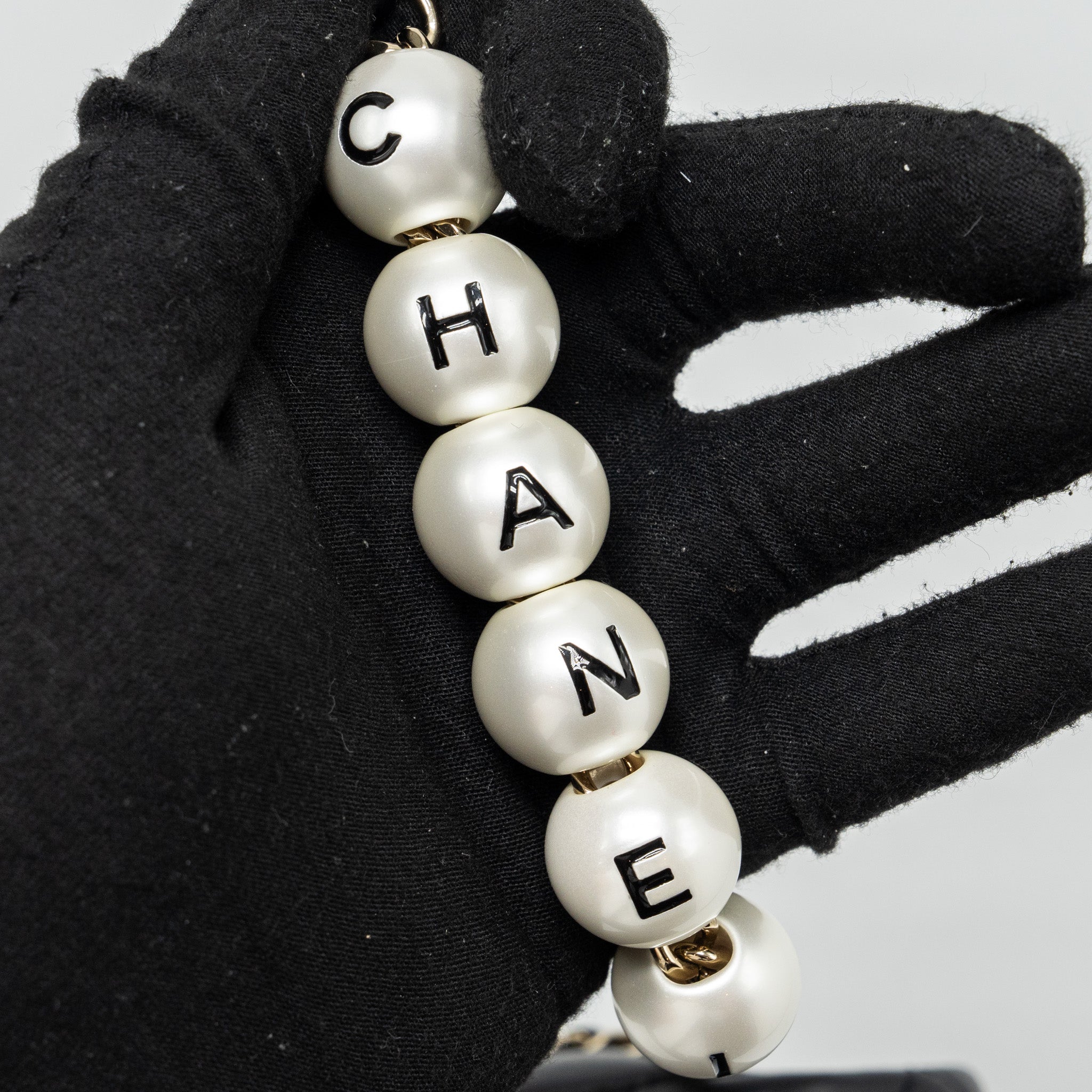 CHANEL QUILTED FLAP BAG WITH PEARL CHAIN LAMBSKIN BLACK LGHW