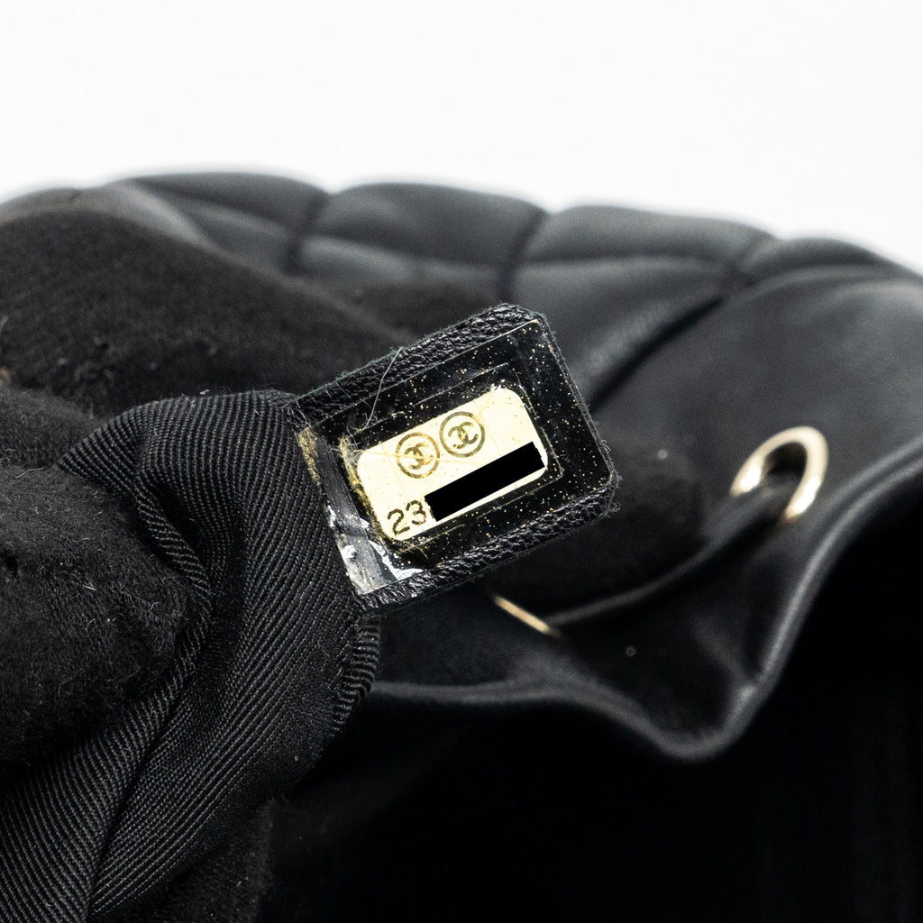 CHANEL QUILTED FLAP BACKPACK LAMBSKIN BLACK GHW