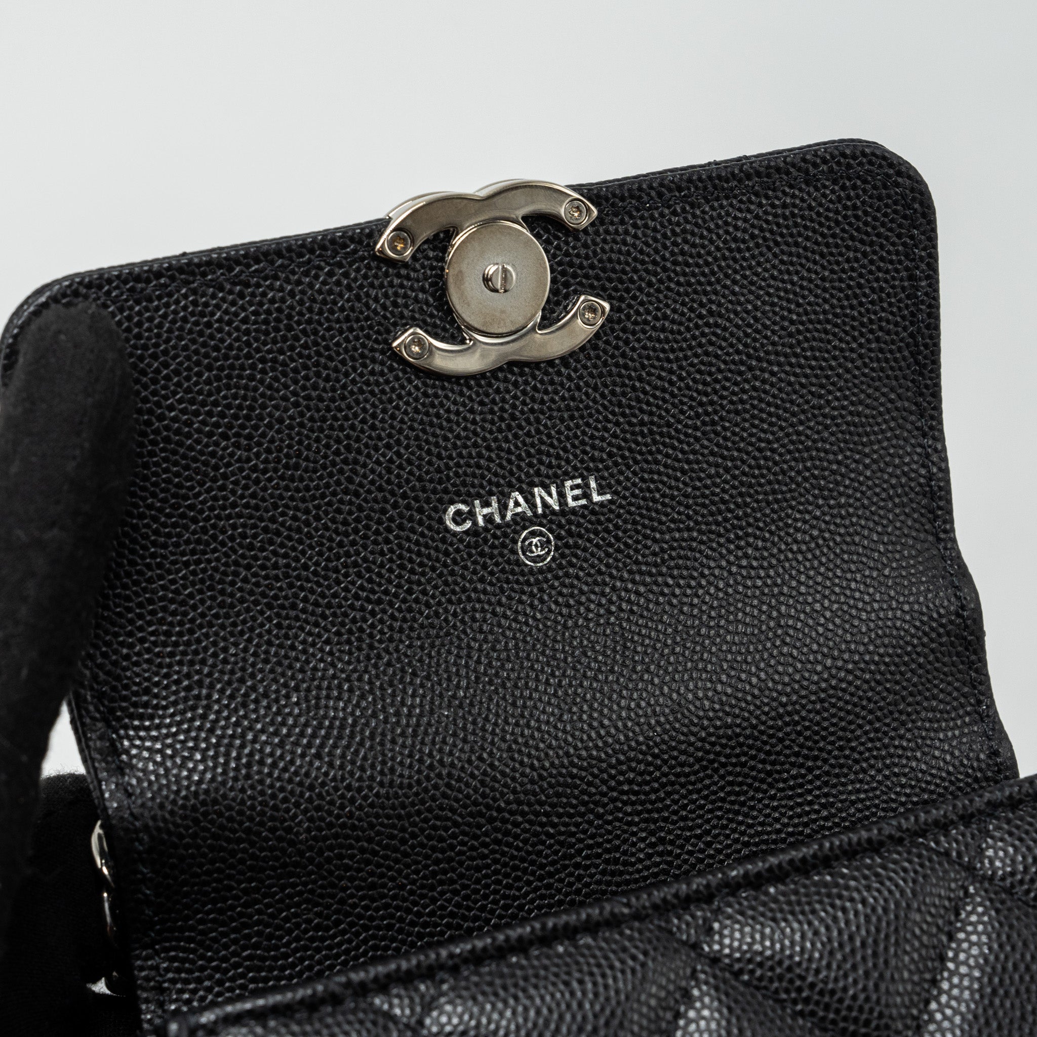 CHANEL 22S COCO LETTERING MINI FLAP BAG WITH ENAMEL TOP HANDLE CAVIAR BLACK SHW