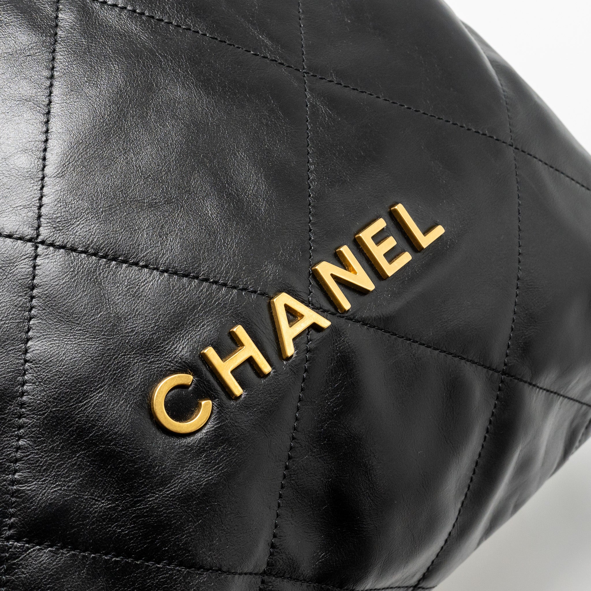 CHANEL LARGE 22 BACKPACK GOLD LETTER LOGO SHINY CALFSKIN BLACK GHW(MICROCHIP)