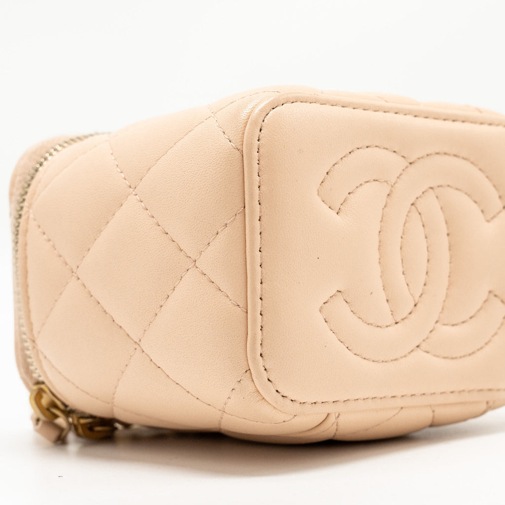 CHANEL MINI VANITY CASE WITH CAMELLIA ADJUSTABLE CHAIN LAMBSKIN BEIGE GHW (MICROCHIP)