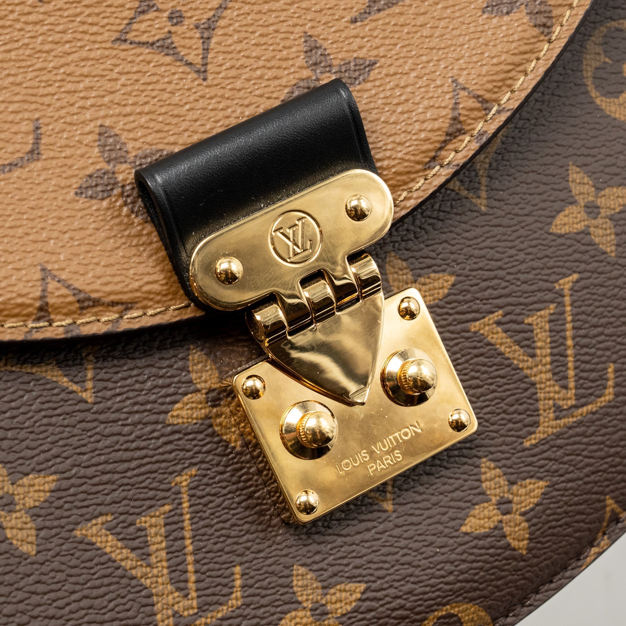 LOUIS VUITTON TILSITT MONOGRAM REVERSE CANVAS GHW