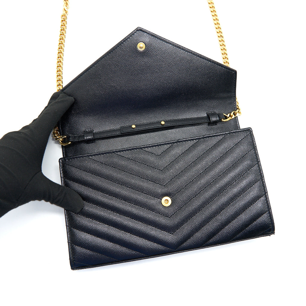 SAINT LAURENT MONOGRAM CHAIN WALLET IN GRAIN DE POUDRE EMBOSSED LEATHER IN BLACK