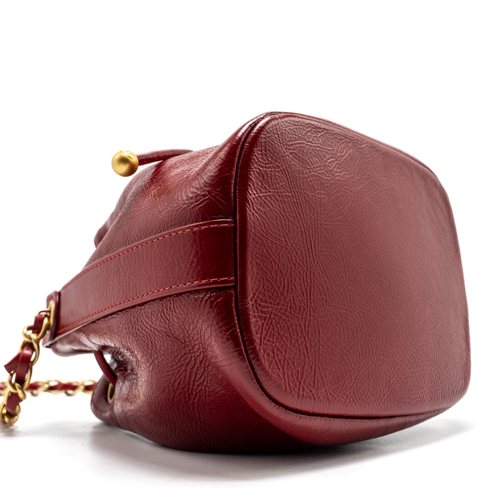 CHANEL CC DRAWSTRING MINI BUCKET BAG SHINY AGED CALFSKIN RED GHW