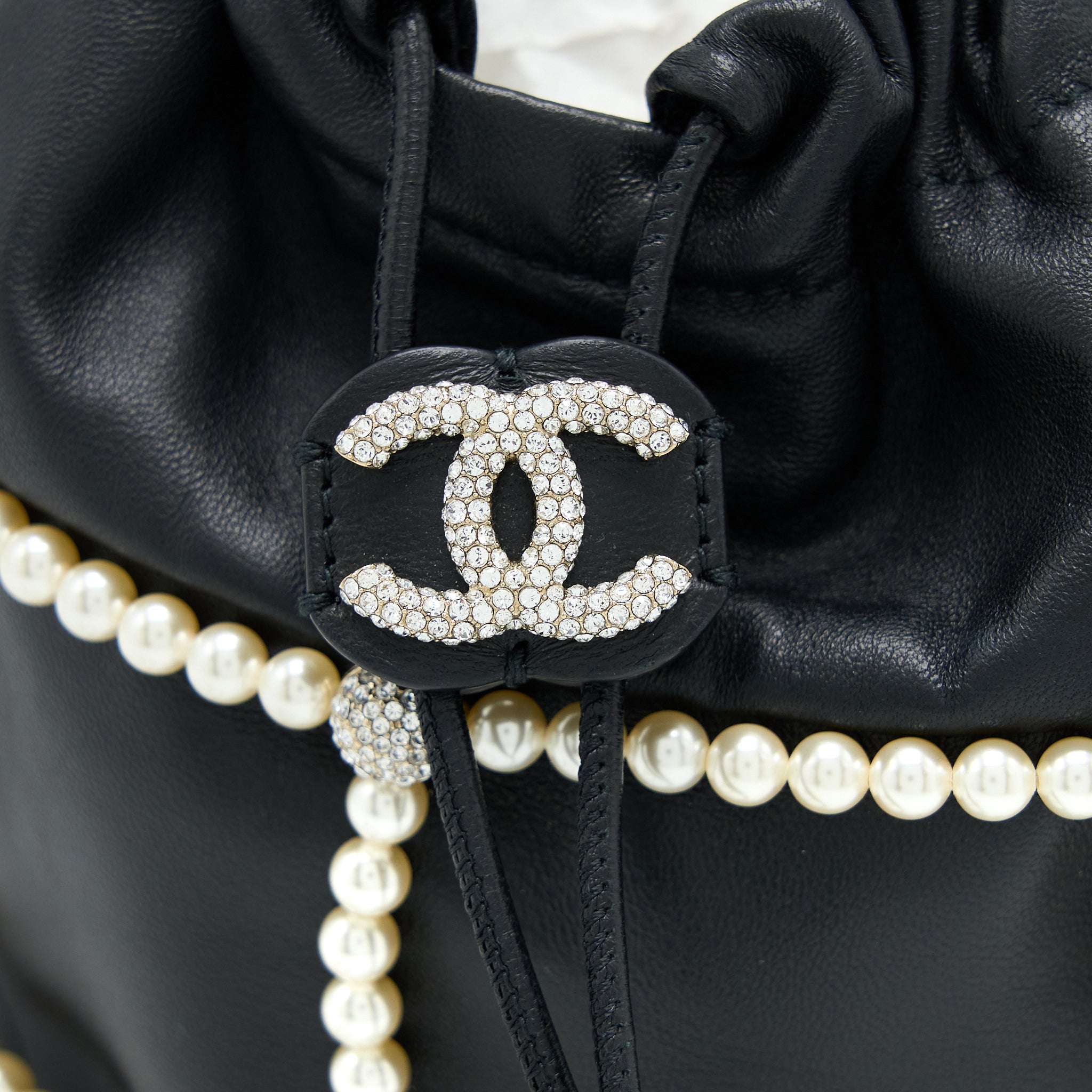 CHANEL BUCKET CRYSTAL CC LOGO PEARL CHAIN BAG LAMBSKIN BLACK SHW
