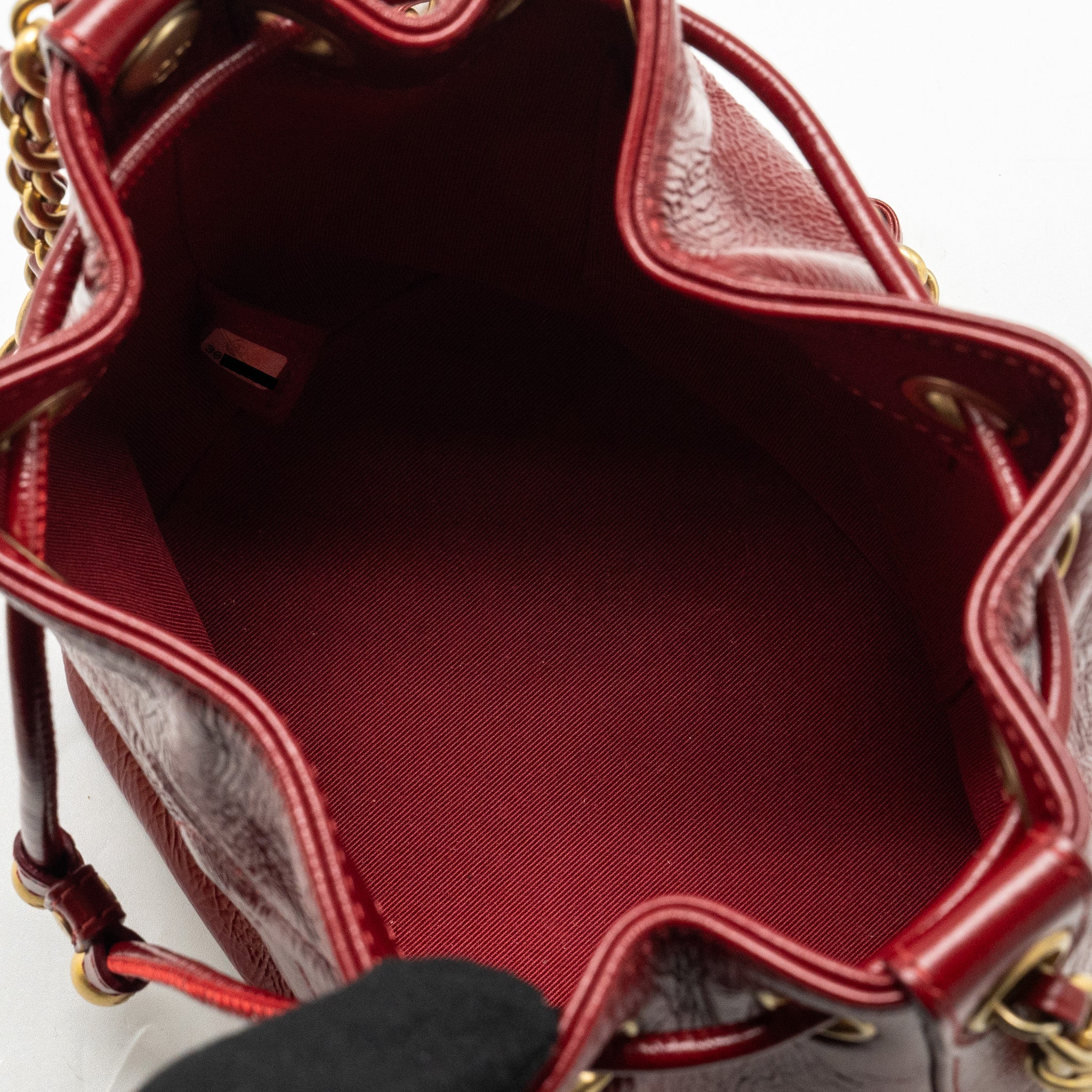CHANEL CC DRAWSTRING MINI BUCKET BAG SHINY AGED CALFSKIN RED GHW