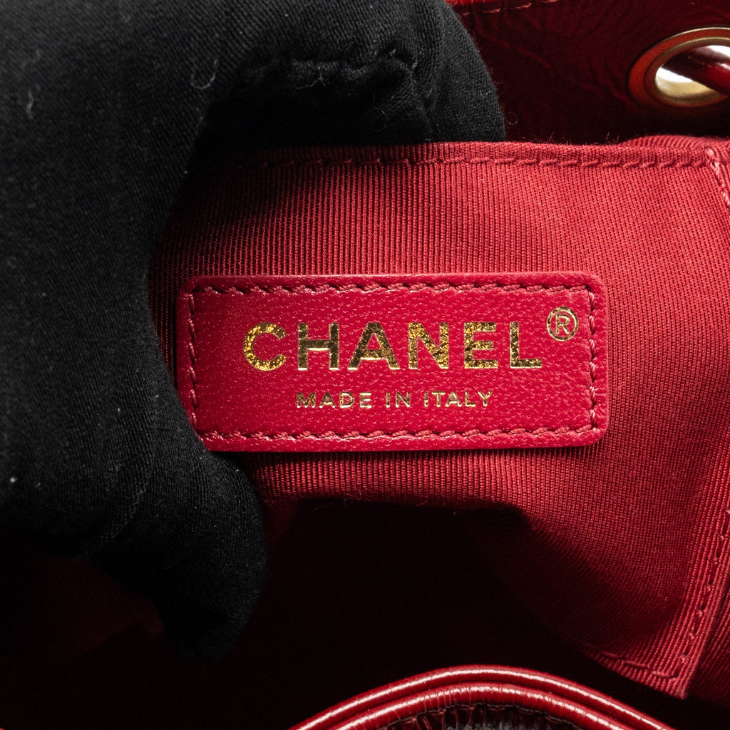 CHANEL CC DRAWSTRING MINI BUCKET BAG SHINY AGED CALFSKIN RED GHW
