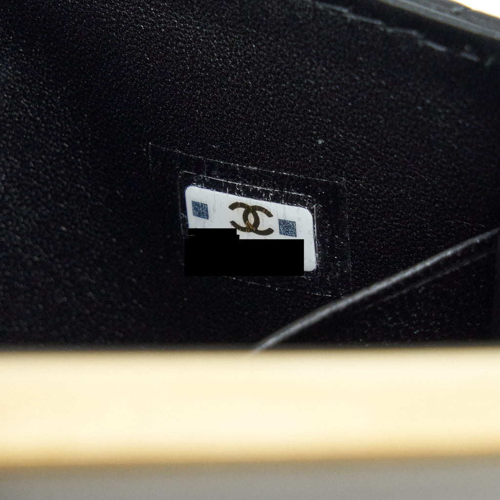 CHANEL 22B FLAP BAG WITH ENAMEL/CC LOGO TOP HANDLE LAMBSKIN BLACK BRUSHED GHW