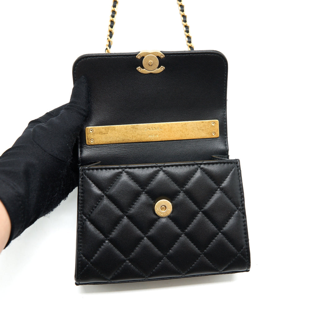CHANEL 22B FLAP BAG WITH ENAMEL/CC LOGO TOP HANDLE LAMBSKIN BLACK BRUSHED GHW